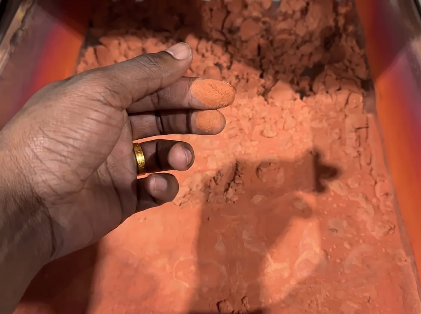 Dried and sized feedstock — the grit you dial in.